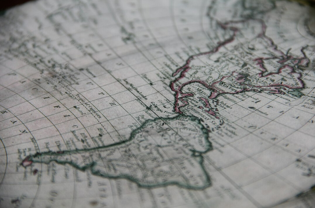 Antique map with a magnifying glass on top