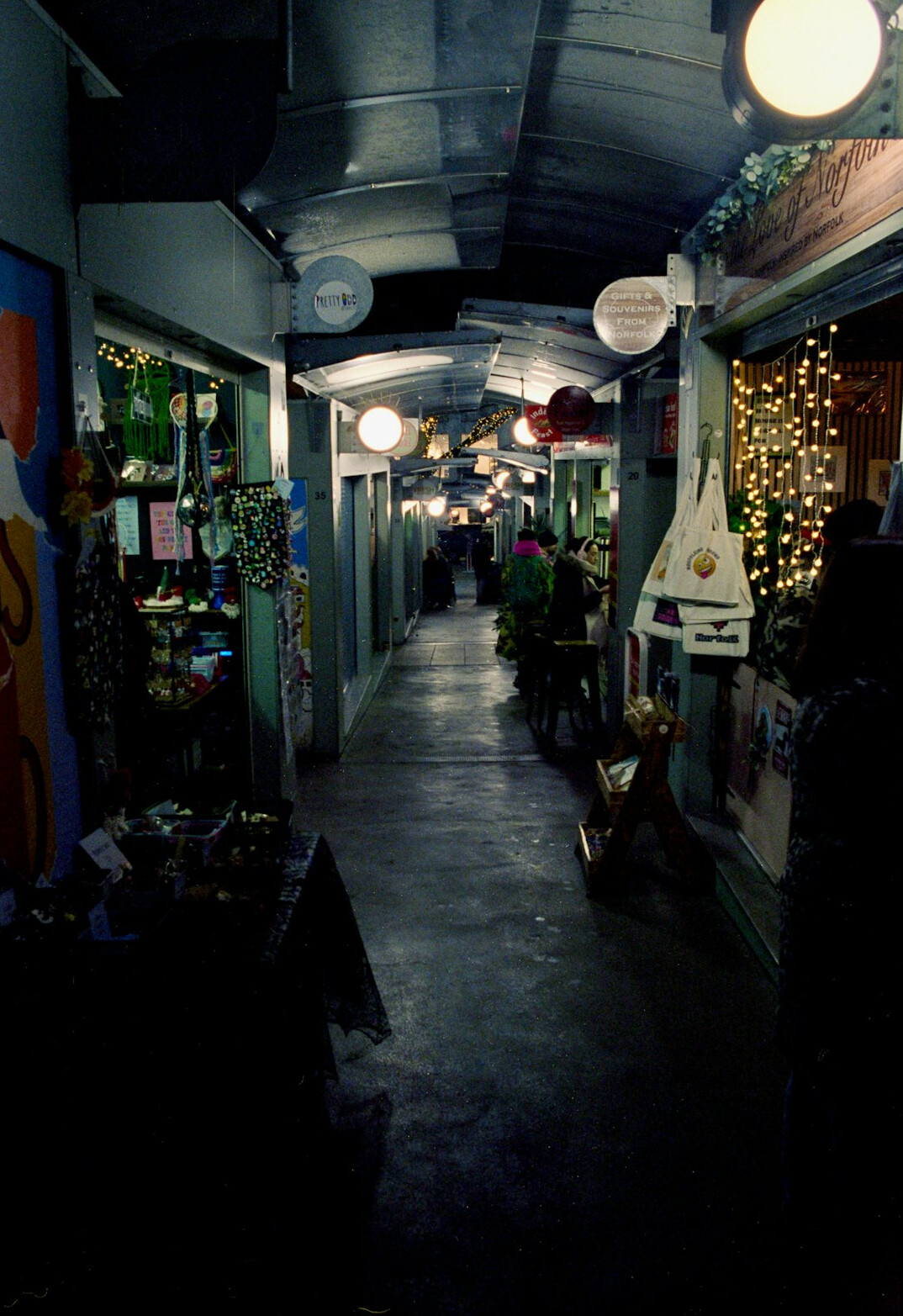 security guard checking aisles at night