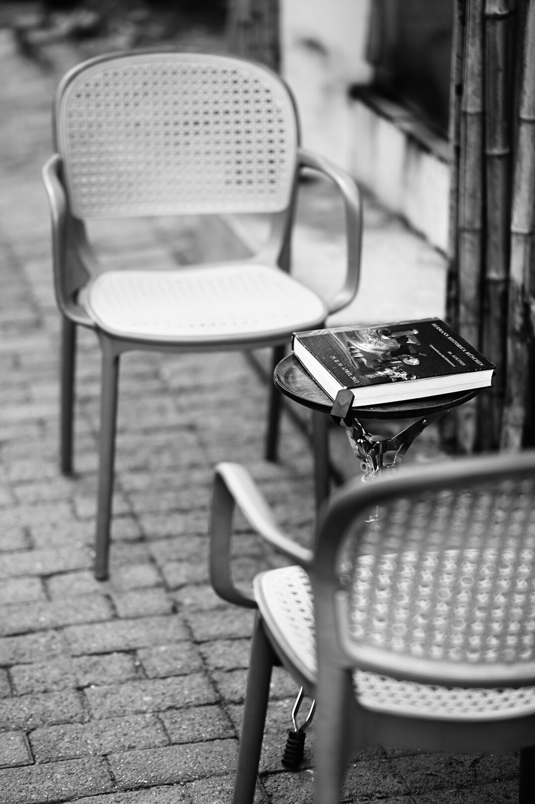 Audio recorder and notebook on a cafe table