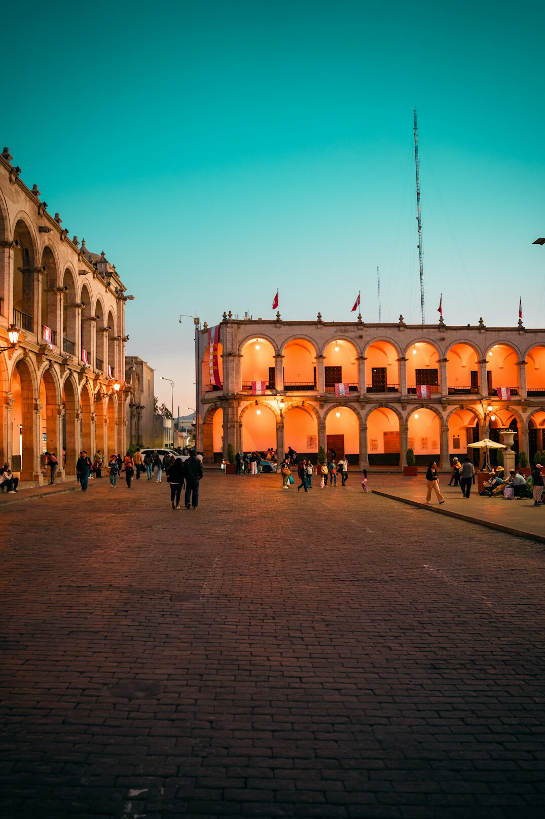 Old cobblestone street in a historic South American city at dusk